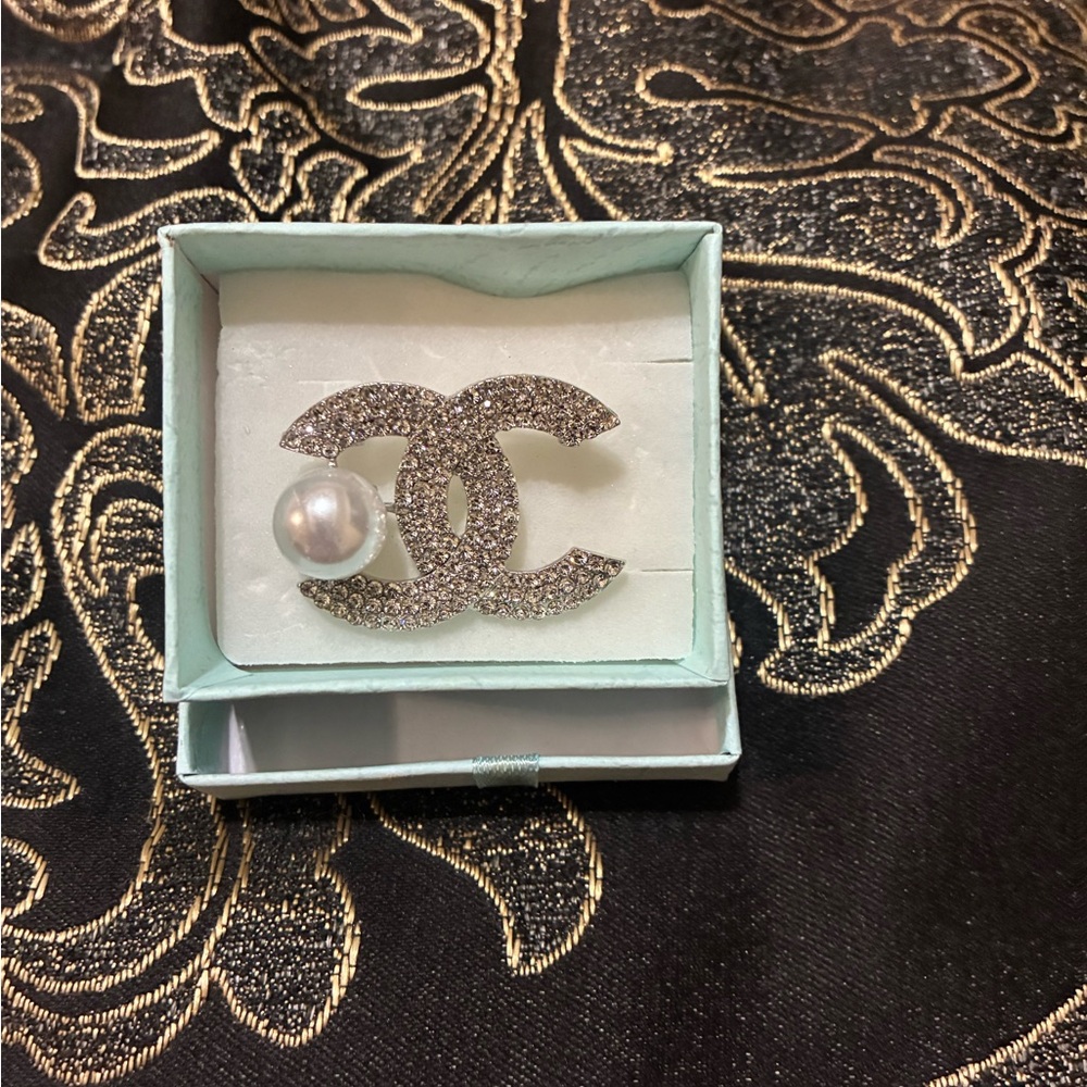 Elegant Silver and Pearl Brooch